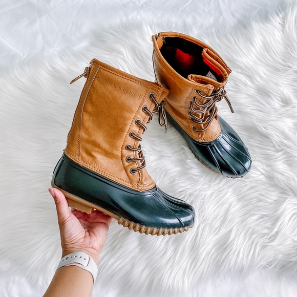 tan and black duck boots